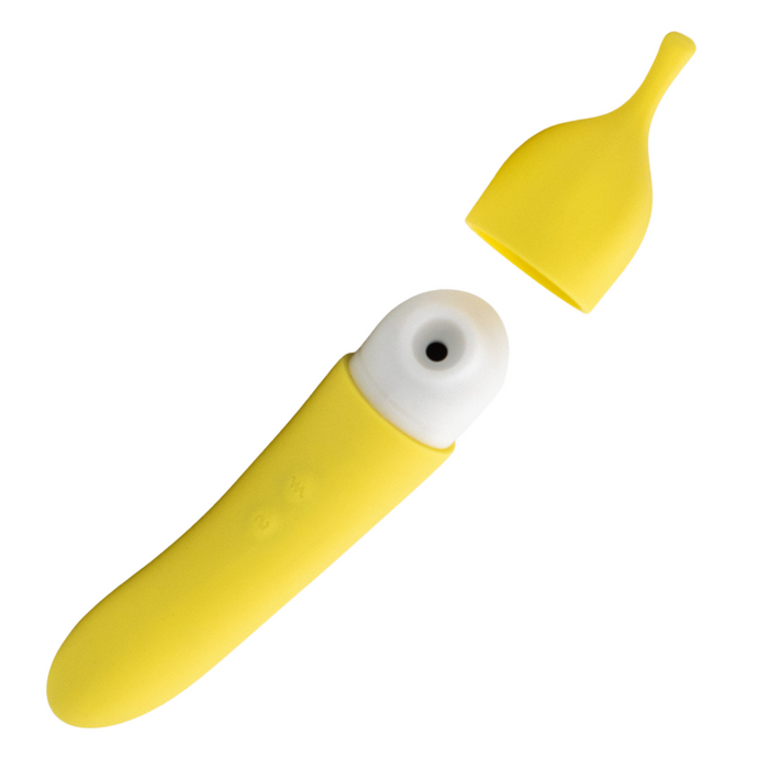 Yellow and white banana clitoral vibe on a white background