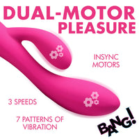 Pink dual-motor pleasure vibe with text on a white background