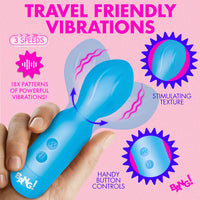 Blue handheld vibrator with text on a pink background