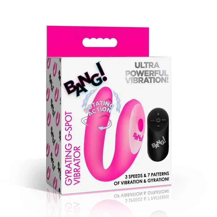 The retail packaging box for the BANG! Gyrating G-Spot Vibrator, featuring a white box with a bright pink top flap, displaying the pink U-shaped vibrator and its black remote control.