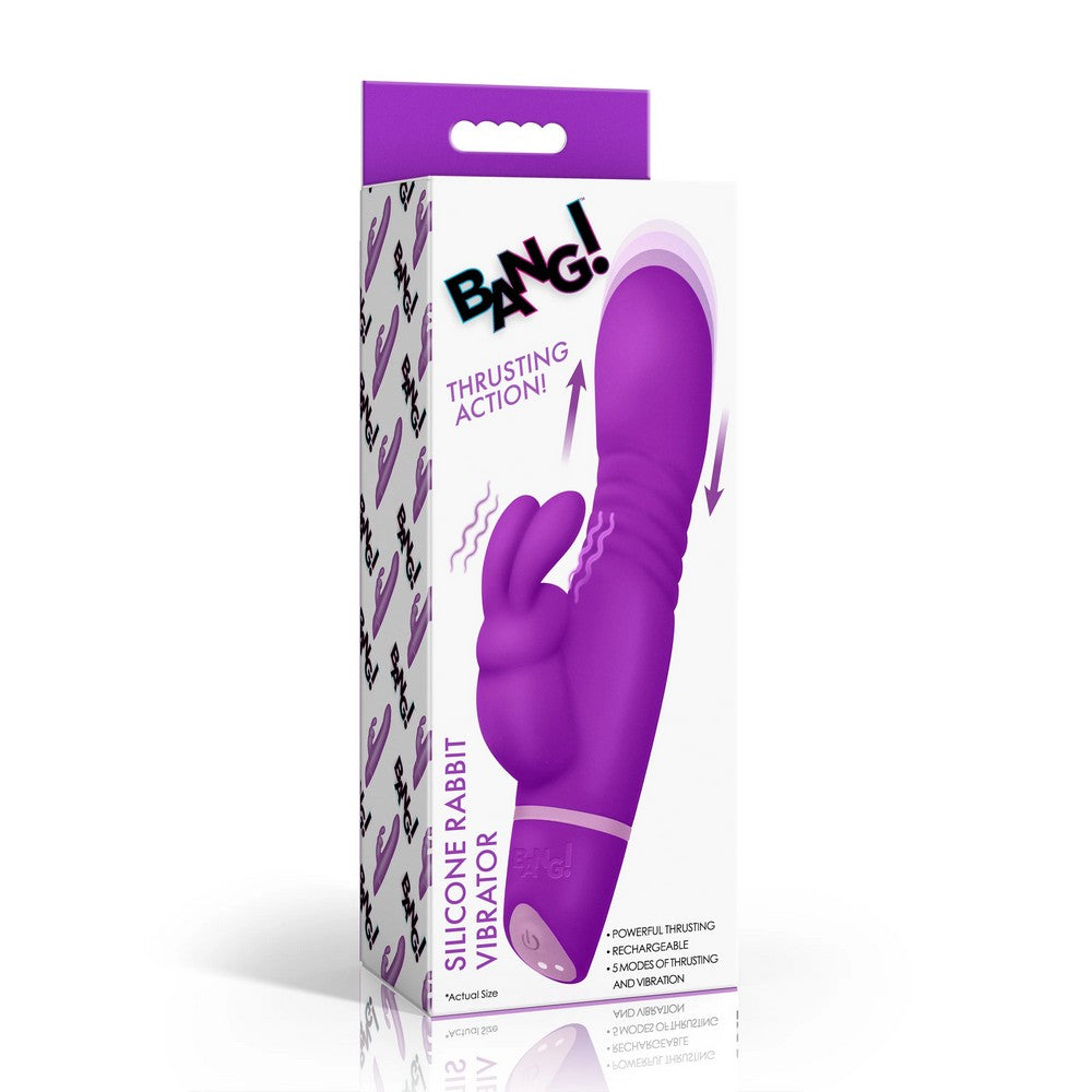 Purple silicone rabbit vibrator with packaging on a white background