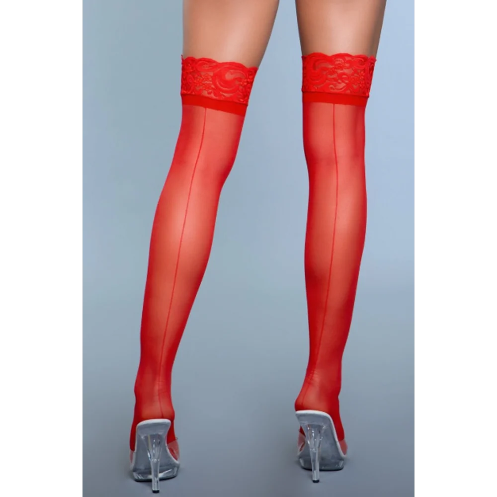 a woman wearing red sheer stockings