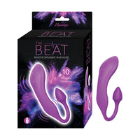 Purple remote orgasmic massager with packaging on a white background