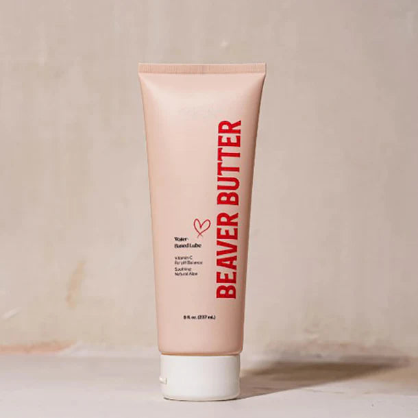 Beaver Butter water based lube tube on a beige background