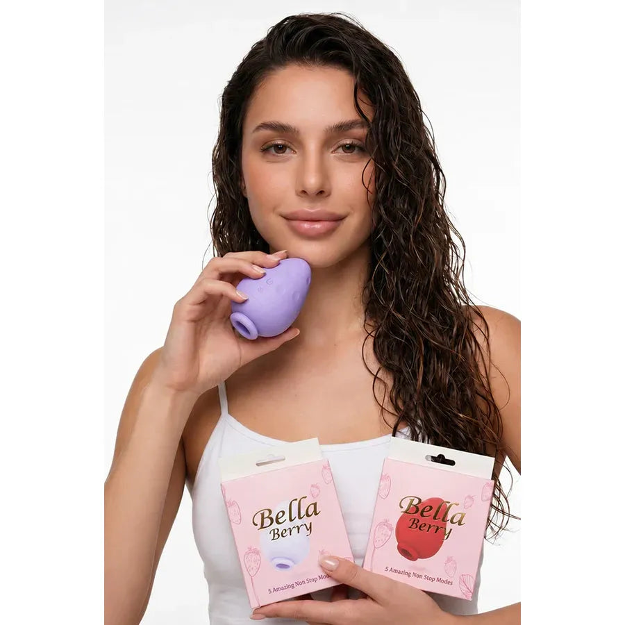 Woman holding a purple product and Bella Berry packaging on a white background