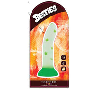 green and clear dildo with weed leafs in plastic packaging