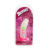Pink and white dildo with the writing slut in packaging with 'Besties' branding on a white background