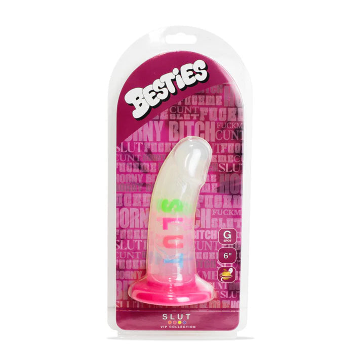 Pink and white dildo with the writing slut in packaging with 'Besties' branding on a white background