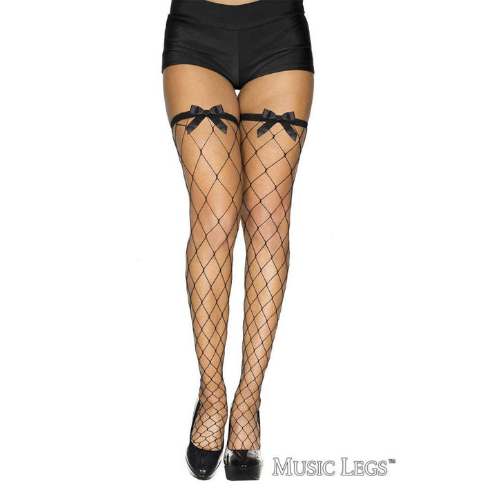 Black fishnet stockings with bow accents worn by a person on a white background, featuring the brand 'Music Legs'.