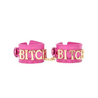pink leather bitch hand cuffs by nobu