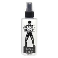 clear spray bottle with a black latex figure on bottle. labeled black beauty latex polish
