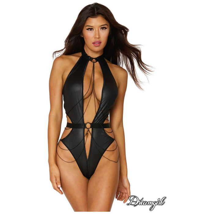 brunette female with black faux leather teddy with open middle from neck to waist with black chains looping