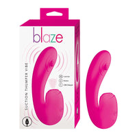 curved vibrator with thumper action on top center, with clitoral suction in pink beside box packaging