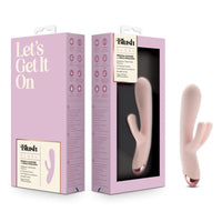 Pink rabbit-shaped vibrator with packaging labeled 'Blush' on a white background