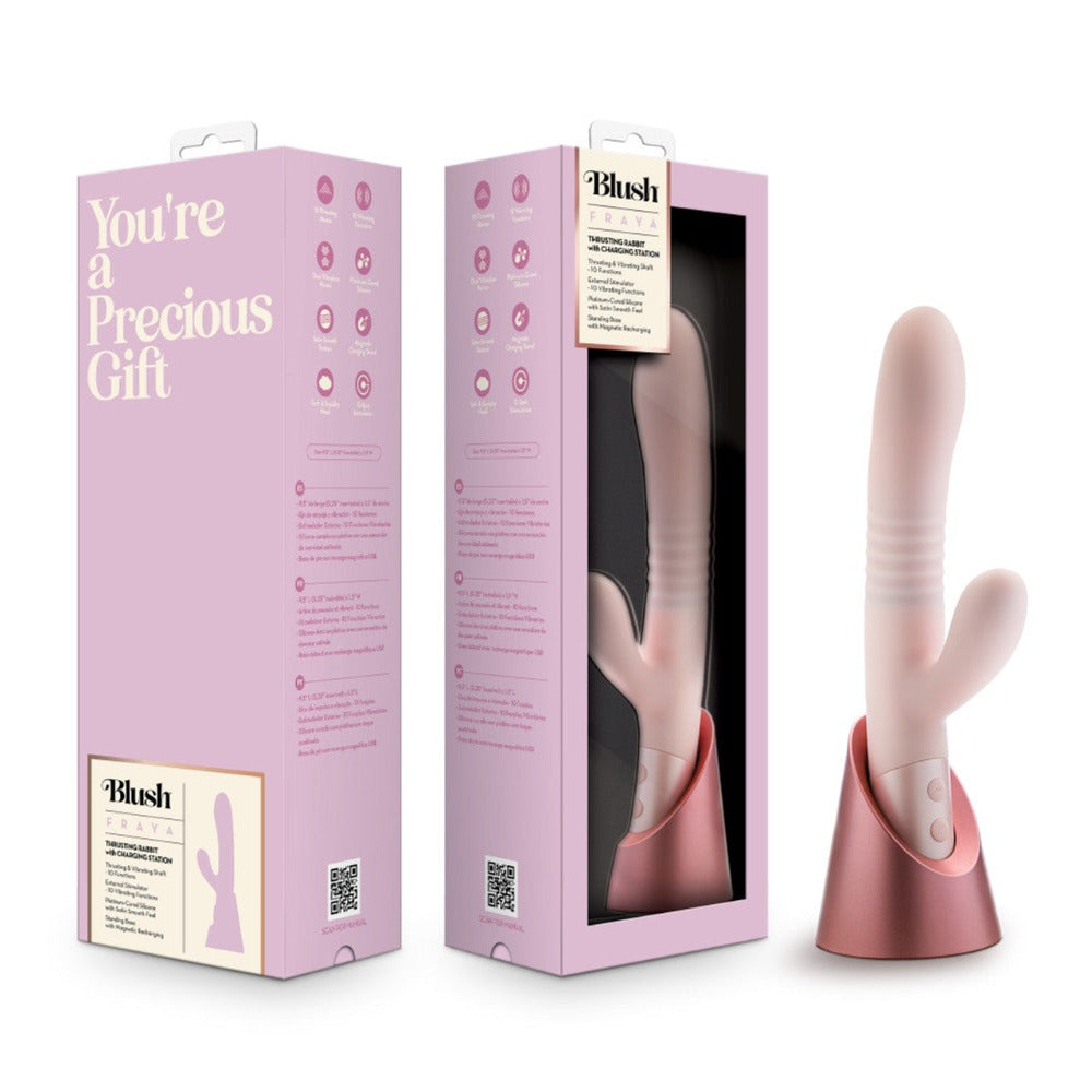 Pink and white vibrator with packaging labeled 'You're a Precious Gift' on a white background
