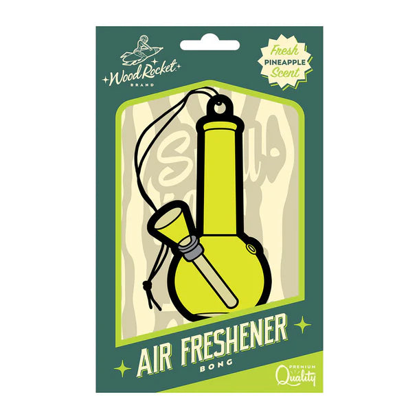 The product image shows a packaged air freshener designed to resemble a bong with a pineapple depicted on it, indicating the scent. The packaging is predominantly green with images of pineapples and text detailing the product name and scent.