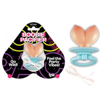 beige boobie pacifier on blue ring