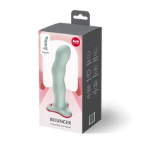 Package of a G-Spot dildo with motion labeled 'Bouncer' on a white background
