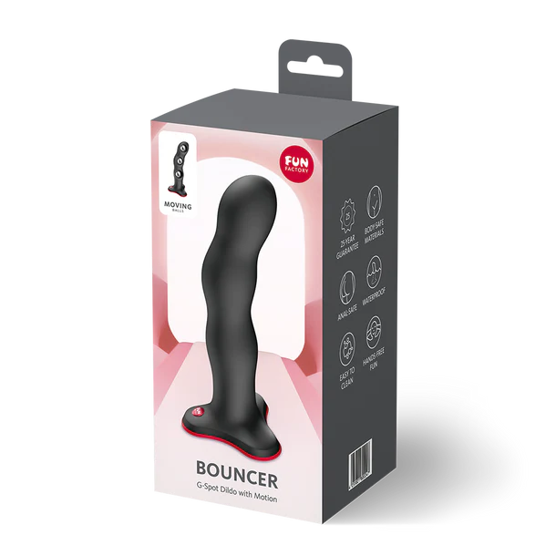 Package of a G-Spot dildó with motion on a white background