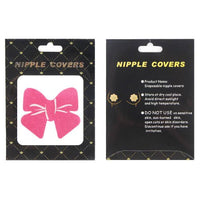 Nipple cover packaging with pink bow design on a black background