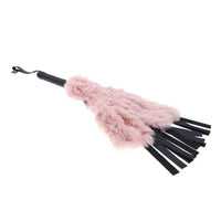 black flogger with pink faux fur cover