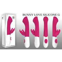 pink vibrator with wide head and rabbit clitoral stimulator
