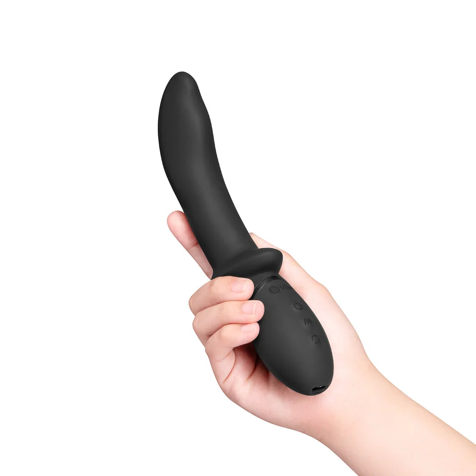 black vibrator held in hand