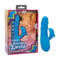 A blue curved personal massager shown next to its retail box. The packaging features a colorful retro design with the text 'California Dreamin' Summer Lovin' and 'Prisco Fantasy'.