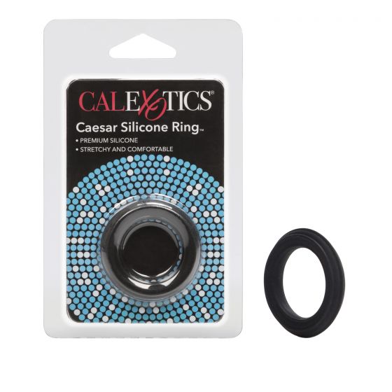 black silicone cock ring next to plastic package
