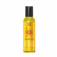 A bottle of Aurora Pheromone Infused Massage Oil with a black cap and a bright yellow label featuring a sun graphic, on a plain white background.