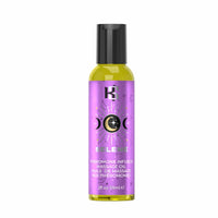 A bottle of SLEBE Pheromone Infused Massage Oil with a black cap and a metallic purple label featuring moon phases and a stylized 'SC' logo.