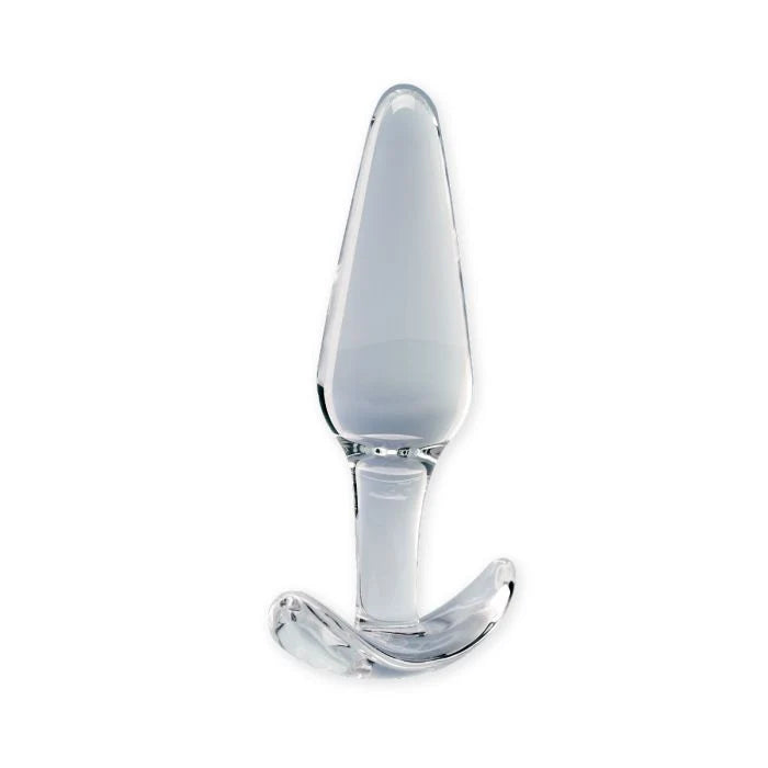 A clear glass butt plug with a smooth, tapered tip and a curved base, shown on a solid white background.