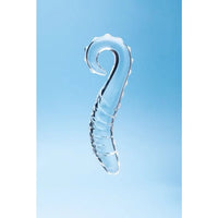 A clear, transparent glass curved hook-shaped dildo with a ribbed textured body, shown against a soft light blue gradient background.