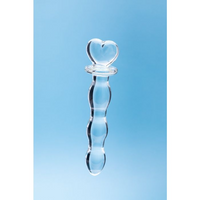 glass dildo with heart on top of handle