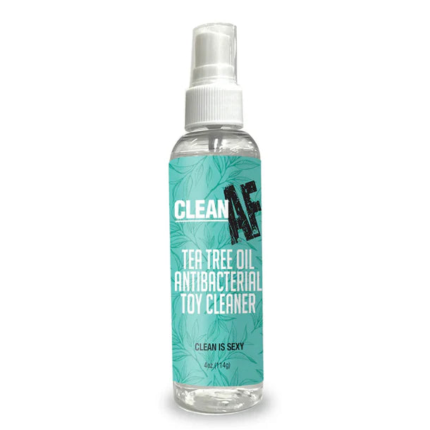 Tea tree oil antibacterial toy cleaner bottle with teal label on a white background