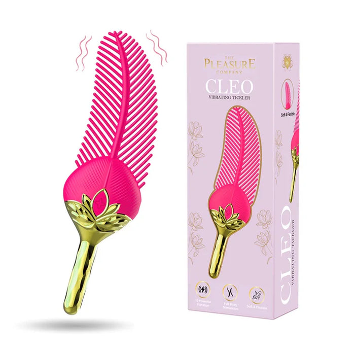 Pink and gold comb-like device with packaging on a white background