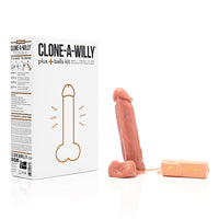 beige cloned dildo with vibrator control and box display