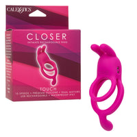 vibrating cock ring  with bunny ears, and ball strap beside box packaing in pink