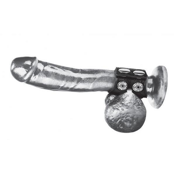 1.5" black leather cock ring with ball strap on display on dildo