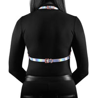 woman wearing a rainbow strapped harness