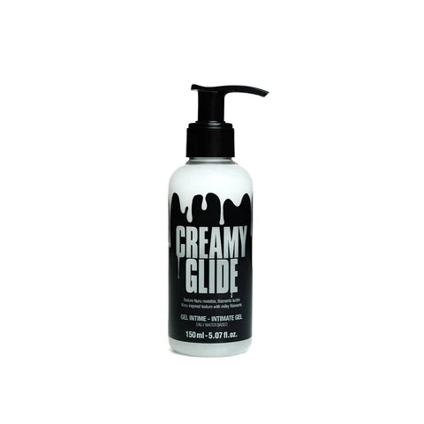 pump bottle of creamy glide lubricant on a white back ground