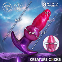 Purple and pink silicone product with measurements on a purple and blue gradient background, featuring 'Creature Cocks' branding.