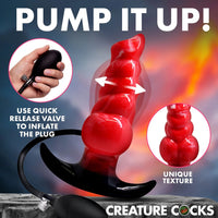 Red inflatable plug with pump and text 'Pump It Up!' on a dark background