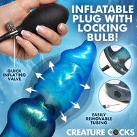 Inflatable plug with locking bulb and hand holding pump, featuring quick inflating valve and easily removable tubing.