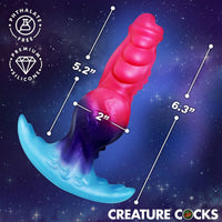 cosmo hound anal plug with measurements on a cosmic background, featuring the brand 'Creature Cocks'.