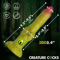 Creature Cocks Eyegor thrusting vibrating dildo displayed with product dimensions showing 9.6-inch total length, 8.4 to 8.8-inch insertable length, 2.1-inch width, 1.2-inch tip diameter, and 0.4-inch thrust length, alongside icons for waterproof rechargeable silicone construction.