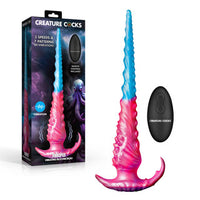Creature Cocks Vibropus vibrating dildo by XR Brands featuring a pink and blue tentacle-inspired design with remote control and fantasy-themed retail packaging.