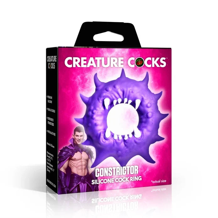 Creature Cocks Constrictor Silicone Cock Ring by XR featuring a purple monster-inspired design with fang and spike details, soft stretchy premium silicone, a 1.1" unstretched inner diameter, and 3.2" overall height