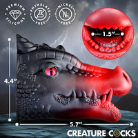 Creature Cocks Drago Silicone Masturbator shown with detailed dimensions and materials. Measures 5.7 inches long by 4.4 inches high with a 1.5-inch opening. Made from premium silicone that is phthalate-free and nickel-free, with a sculpted black-and-red dragon design and textured opening.