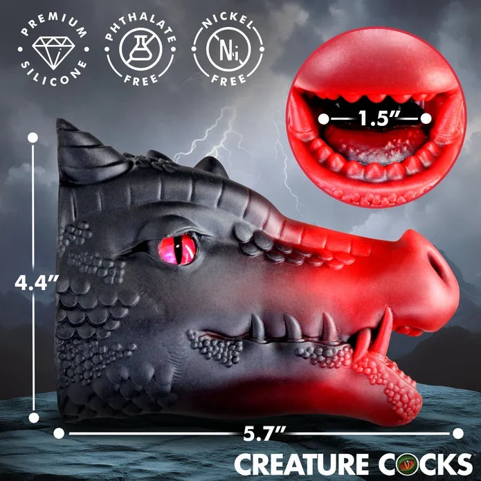 Creature Cocks Drago Silicone Masturbator shown with detailed dimensions and materials. Measures 5.7 inches long by 4.4 inches high with a 1.5-inch opening. Made from premium silicone that is phthalate-free and nickel-free, with a sculpted black-and-red dragon design and textured opening.